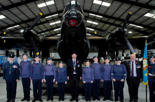 TMS staff supporting the cadets with Poppy day launch with Lancaster bomber ‘Just Jane’ in the photo.